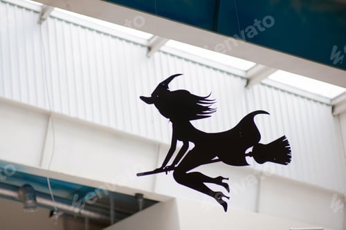 Preview: Flying witch black silhouette minimalistic decor element at halloween holiday