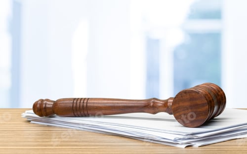 Preview: judge hammer on white paper and table