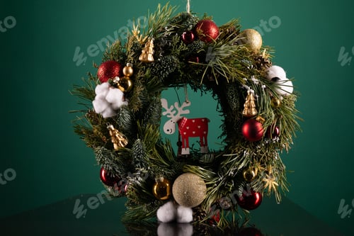 Preview: Christmas Wreath and Ornaments on Table