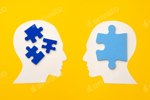 Preview: Papercut head silhouette with puzzle pieces on yellow background
