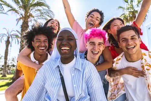 Preview: Multiethnic group of young happy friends hanging out