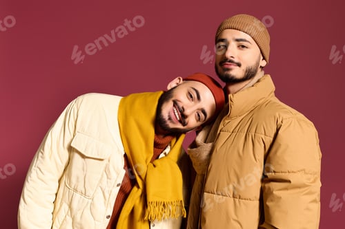 Preview: Stylish twin brothers showcase their unique fashion sense in a cozy atmosphere