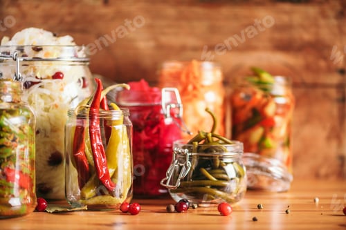 Preview: Probiotics food background. Korean carrot, kimchi, beetroot, sauerkraut, pickled cucumbers in glass