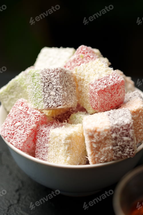 Preview: Colorful assortment of traditional sweets arranged in a bowl, perfect for celebrations and