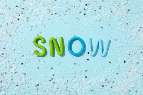 Preview: The word "snow" is made of colored plasticine on a blue background.