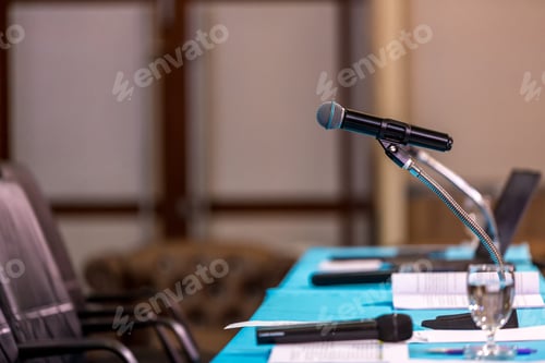 Preview: Microphone in concert hall or conference room soft and blur style for background.