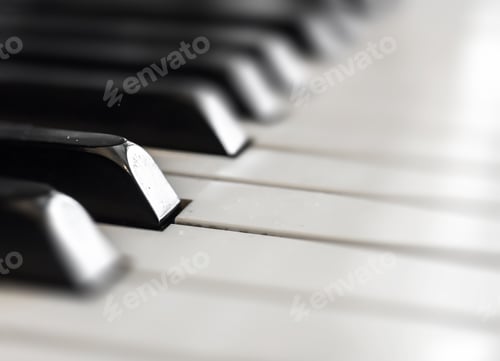 Preview: Piano keyboard background with selective focus. Space for text.