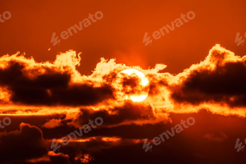 Preview: Beautiful colorful orange sky with clouds at sunset
