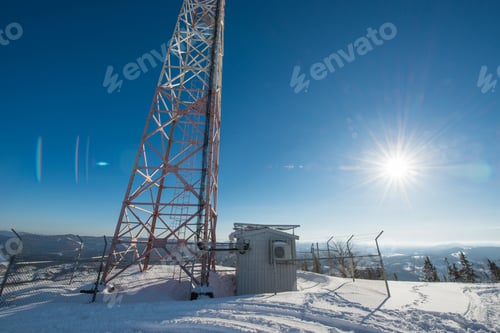 Preview: Cellular tower against background starry night sky