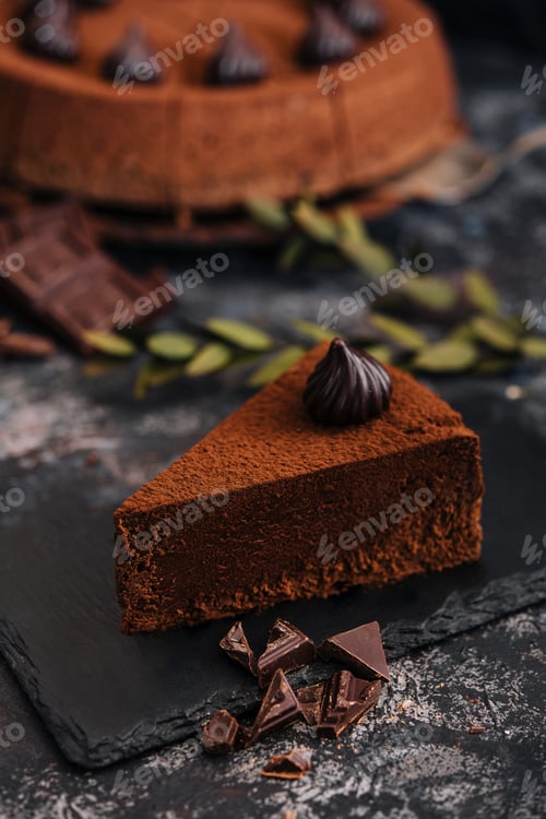 Preview: slice of tasty chocolate cake with chocolate sliced