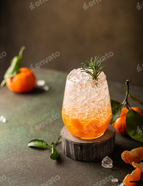Preview: Fresh cocktail with crushed ice, rosemary and tangerines