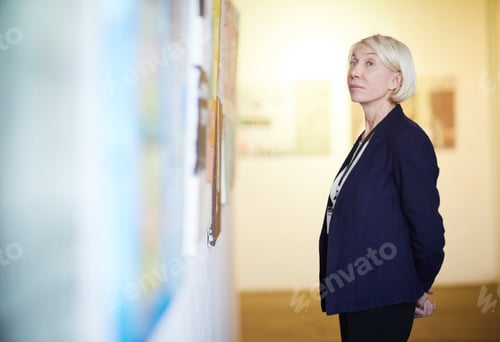 Preview: Mature Woman Looking at Paintings