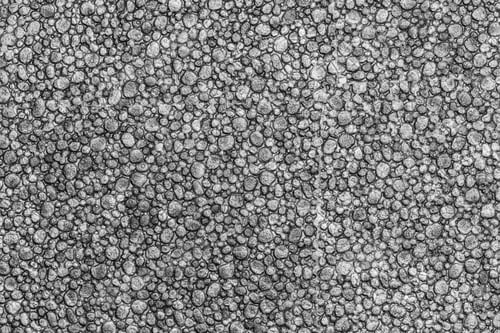 Preview: Black Color Styrofoam Texture Background. Close-Up of Abstract Plastic Material Pattern