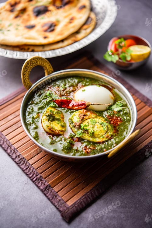 Preview: Spinach egg curry is an Indian non vegetarian dish made using palak gravy with eggs