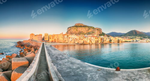 Preview: Scenic evening cityscape of Cefalu city.
