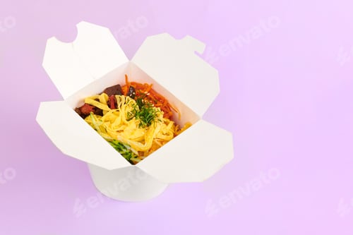 Preview: Rice wok with seafood and vegetables in white box isolated on purple background, takeaway food