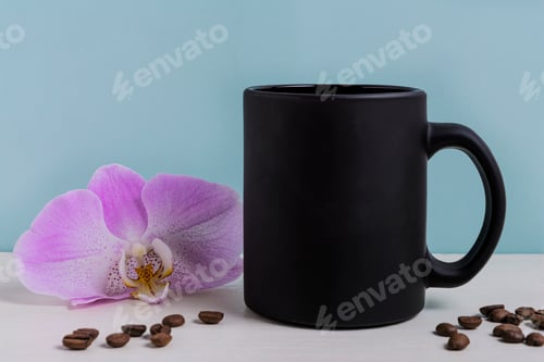 Preview: Black mug mockup with pink orchid and coffee beans