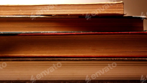 Preview: Wide closeup shot of a stack of books