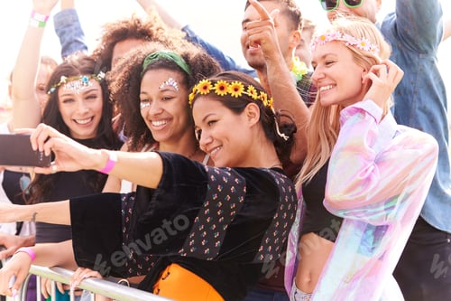 Preview: Young Friends In Audience Behind Barrier At Outdoor Music Festival Posing For Selfie