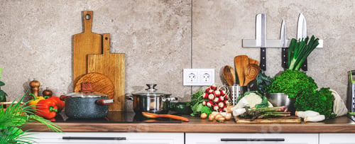 Preview: Kitchen countertop with vegetables, asparagus, cabbage and mushrooms for healthy cooking