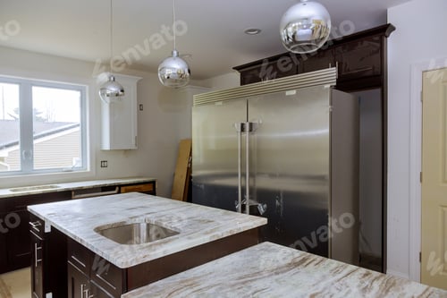 Preview: New white kitchen installed furniture cabinets and countertop with appliances