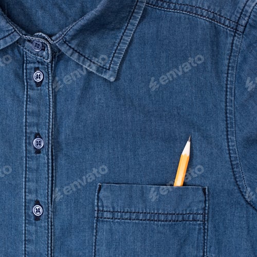 Preview: close-up view of stylish denim shirt with pencil in pocket