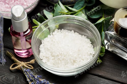 Preview: Relaxing spa setup with bath salts and essential oils on wooden table