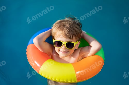 Preview: Happy child swimming on summer vacation