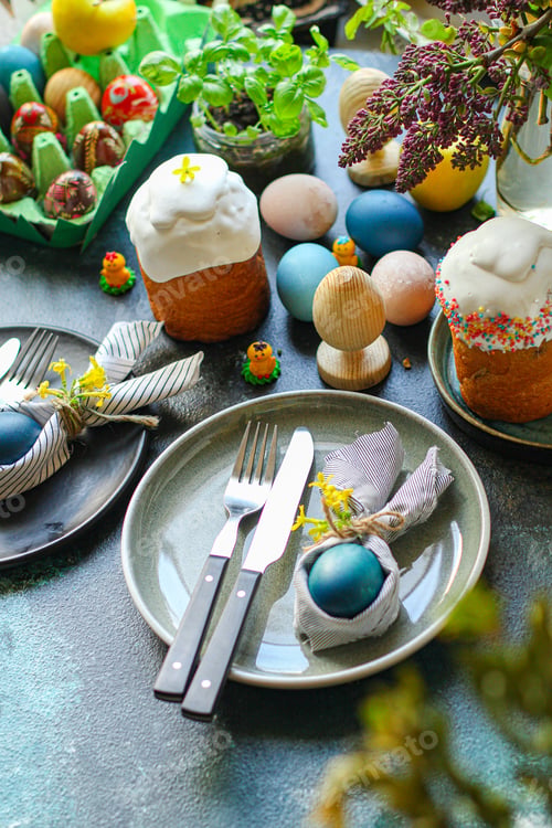 Preview: Easter Table Setting Bunny Napkin, Easter Cake And Painted Eggs Healthy Meal Top View Copy Space