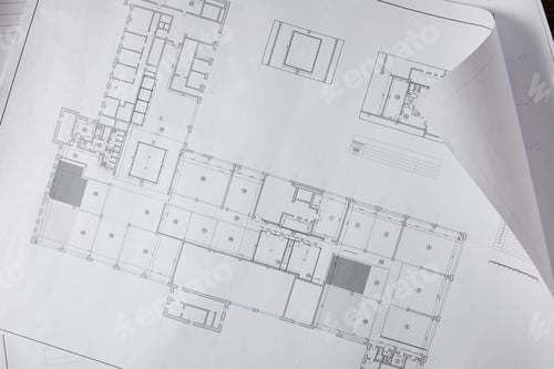 Preview: view from above of architectural blueprint on white paper