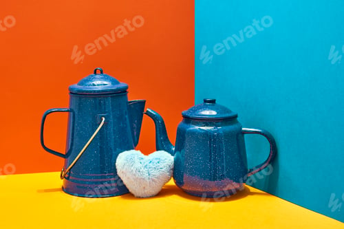 Preview: Valentine's Day. Blue teapots with a heart between the two