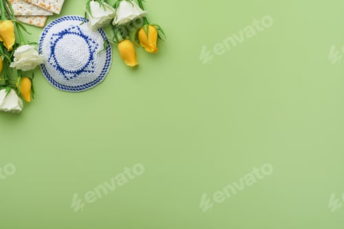 Preview: Passover celebration concept. Matzah, kosher red wine, walnut and spring white and yellow rose flowe