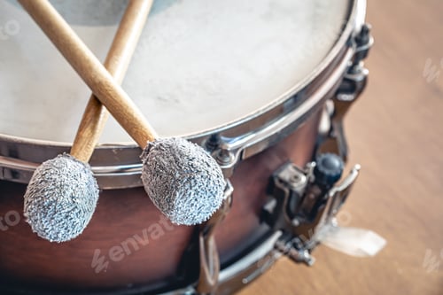 Preview: Close-up, drumsticks on a blurred background.