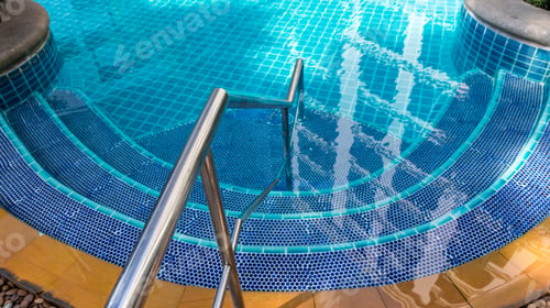 Preview: Ladder stainless handrails for descent into swimming pool.