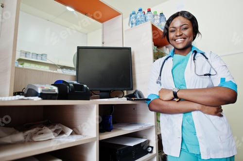 Preview: African american pharmacist working in drugstore