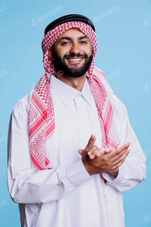 Preview: Muslim man clapping hands portrait