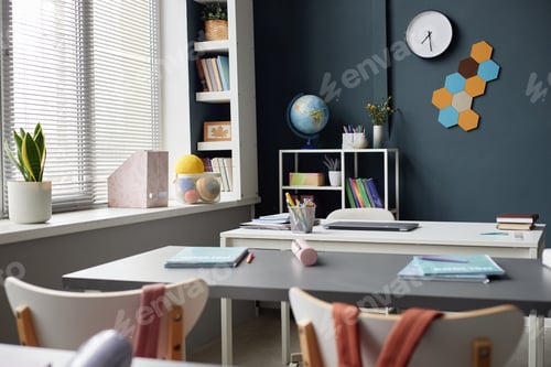 Preview: Empty Classroom Showing Desks and Educational Supplies during Daytime