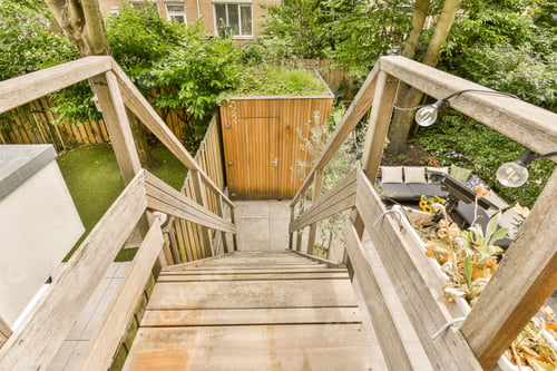 Preview: a set of wooden stairs in a garden