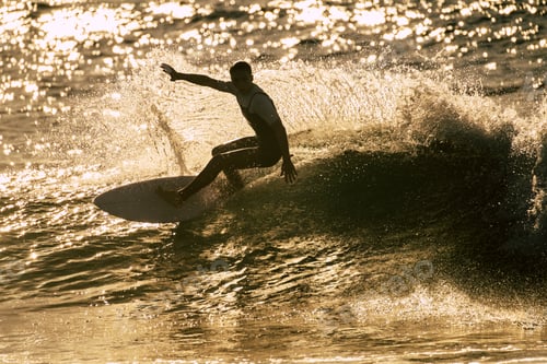 Preview: teenager surfing at the wave in tenerife playa de las americas