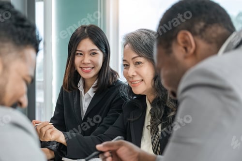 Preview: Happy diverse different aged and multiethnic business team discussion work. Leader and employees