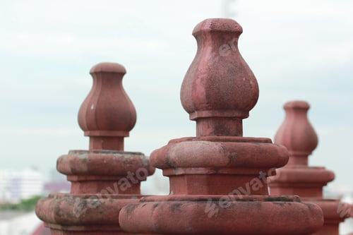 Preview: Pagoda at the end of the brown fence.