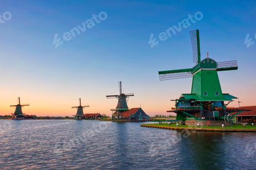 Preview: Windmills at Zaanse Schans in Holland on sunset. Zaandam, Netherlands