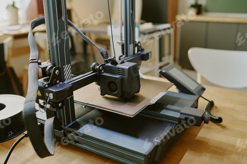 Preview: Operating High-Precision 3D Printer in Modern Workspace
