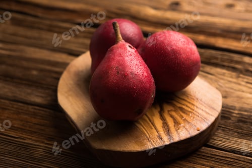 Preview: Ripe pears dark background, rustic style, top view. fresh and healthy food. Autumn background.