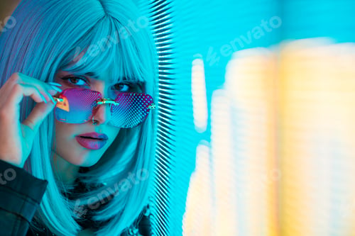 Preview: Beautiful woman illuminated by led lights