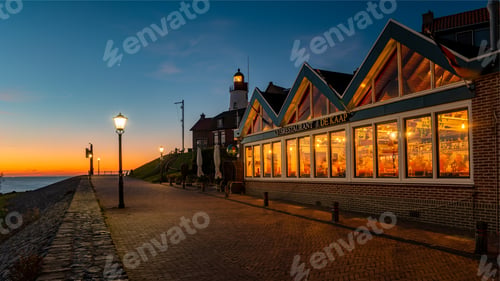 Preview: Urk Flevoland Netherlands sunset at the lighthouse and harbor of Urk Holland