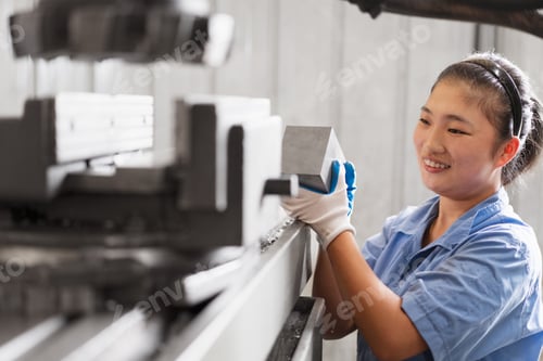 Preview: Female factory worker in crane factory, China