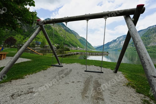 Preview: Wooden swing in playground at Hallstatt, Austria.