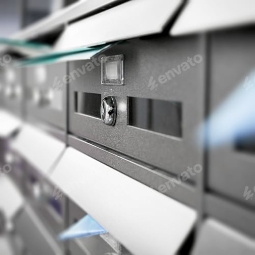 Preview: Close Up of Metal Mailboxes with Delivery