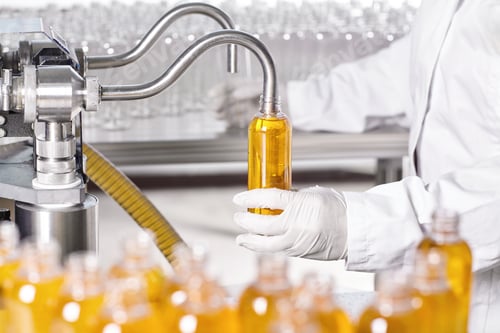 Filling Bottles with Liquid on a Production Line